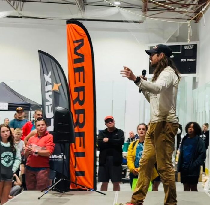 Matt Shepard delivering The Mountain Method keynote at a trail running event in Alberta