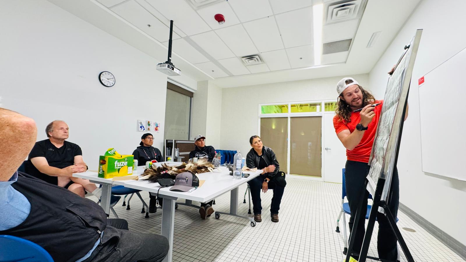 Matt Shepard delivering a keynote presentation to a corporate audience